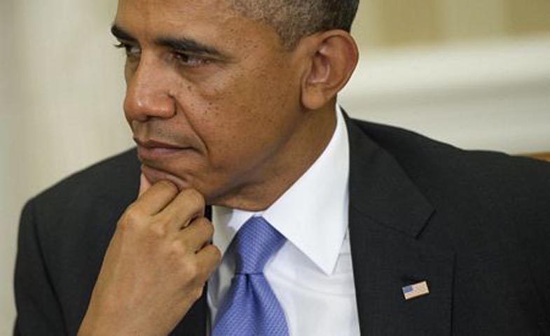 Tổng thống Obama lắng nghe phát biểu của Chủ tịch Trương Tấn Sang.