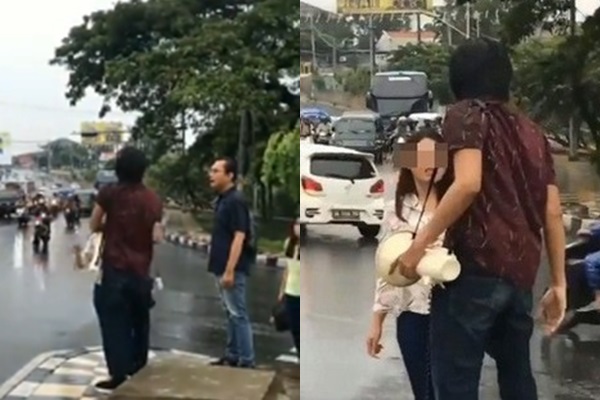 Chàng trai và cô gái cãi nhau dưới đường.