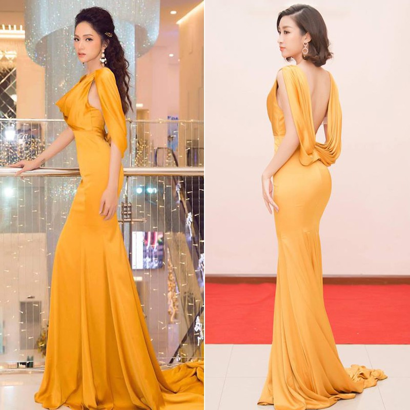 Mẫu váy đuôi cá của NTK Linh San nói thực đều hợp với sắc vóc của Đỗ Mỹ Linh lẫn Hương Giang.    