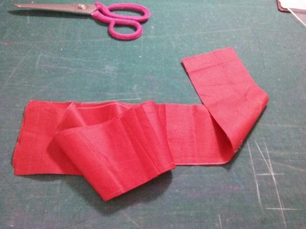 Đặt mảnh vải đỏ trong ví gặp nhiều may mắn