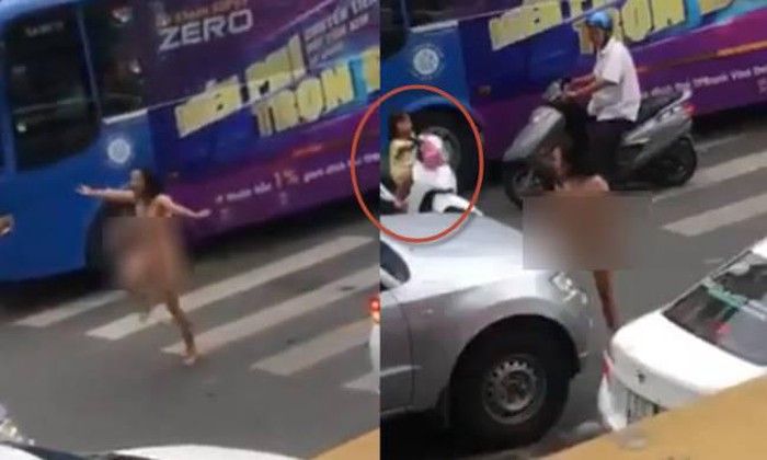Người phụ nữ khỏa thân chặn xe giữa đường.