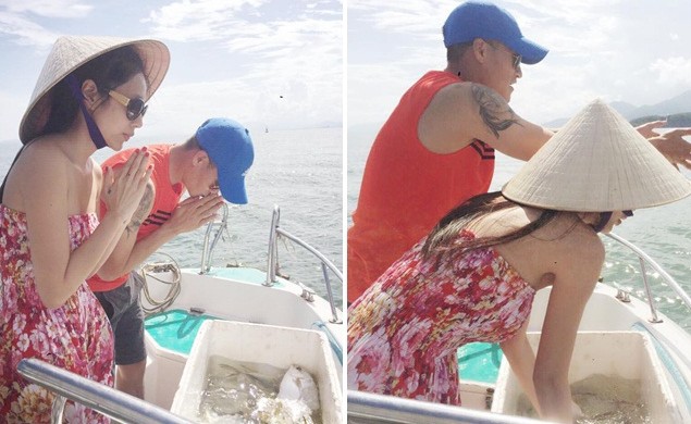 Hai vợ chồng nữ ca sĩ đã chia sẻ khoảnh khắc cùng nhau đi thả cá phóng sinh.
