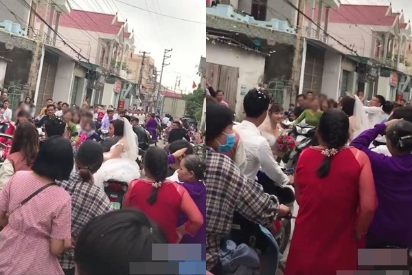 Hai cô dâu trao đổi hoa cưới giữa đường.