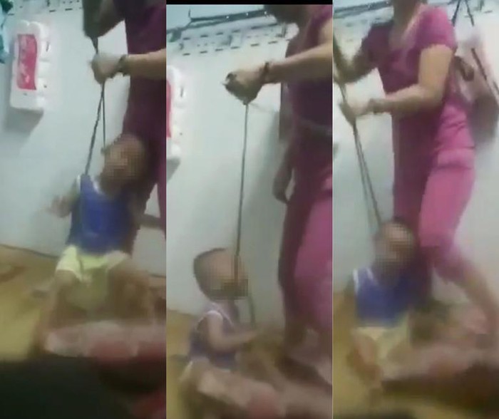 Đứa trẻ 3 tuổi bị mẹ bạo hành. Ảnh cắt từ clip