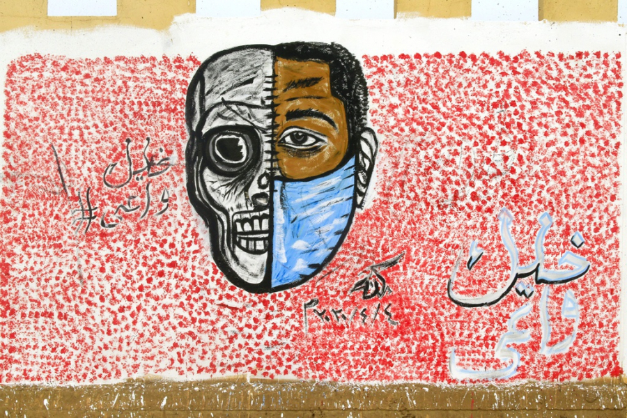Đây là bức tranh đường phố được vẽ tại Khartoum, Sudan, vẽ một người một nửa khuôn đeo mặt khẩu trang, nửa còn lại là xương người. Đây là lời cảnh tỉnh người dân không được phép lơ là, ranh giới giữa sự sống và cái chết vô cùng mỏng manh. Đi kèm bức tranh là hashtag 