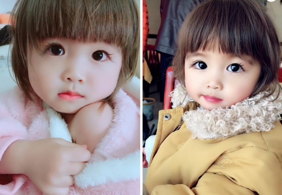Cô bé sở hữu nước da trắng, đôi mắt to tròn trông như búp bê.