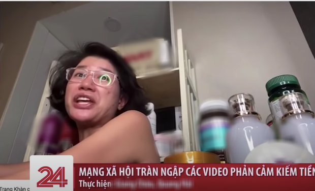 Hình ảnh Trang Trần xuất hiện trên sóng truyền hình trong bản tin về chuyện mạng xã hội tràn ngập video phản cảm kiếm tiền.