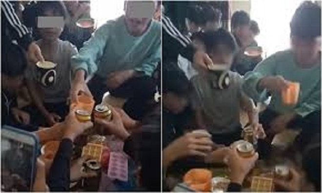 Hình ảnh cắt ra từ clip ghi lại cảnh học sinh uống bia tại phòng của cô giáo