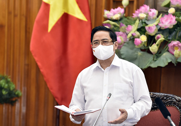 Thủ tướng Phạm Minh Chính yêu cầu xử lý nghiêm các đối tượng lợi dụng chính sách phòng, chống dịch Covid-19 và việc quyên góp, ủng hộ của nhân dân để trục lợi (Ảnh: Tuổi Trẻ)