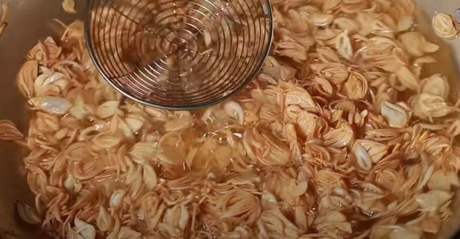 Frying shallots in a pan