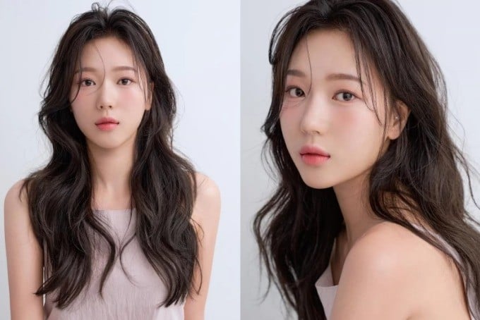 Nếu bạn thích để tóc dài, tóc xoăn lơi rẽ ngôi giữa sẽ là “trợ thủ” giúp khuôn mặt dài trở nên hài hòa hơn.