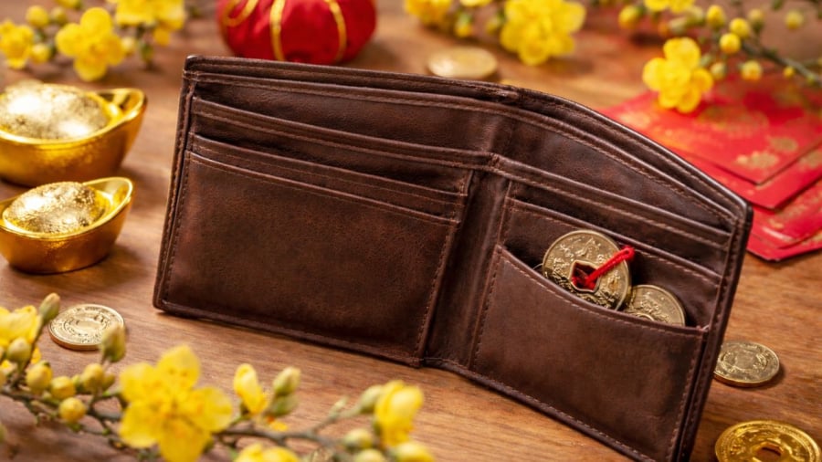 Cho đồng xu may mắn vào ví có thể mang lại tài lộc tốt