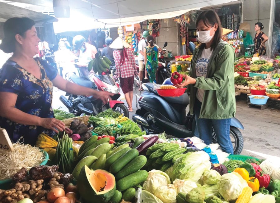 Hãy đặt ngân sách trước khi đi chợ và tuân thủ, cũng như dùng tiền mặt. (Ảnh minh họa)