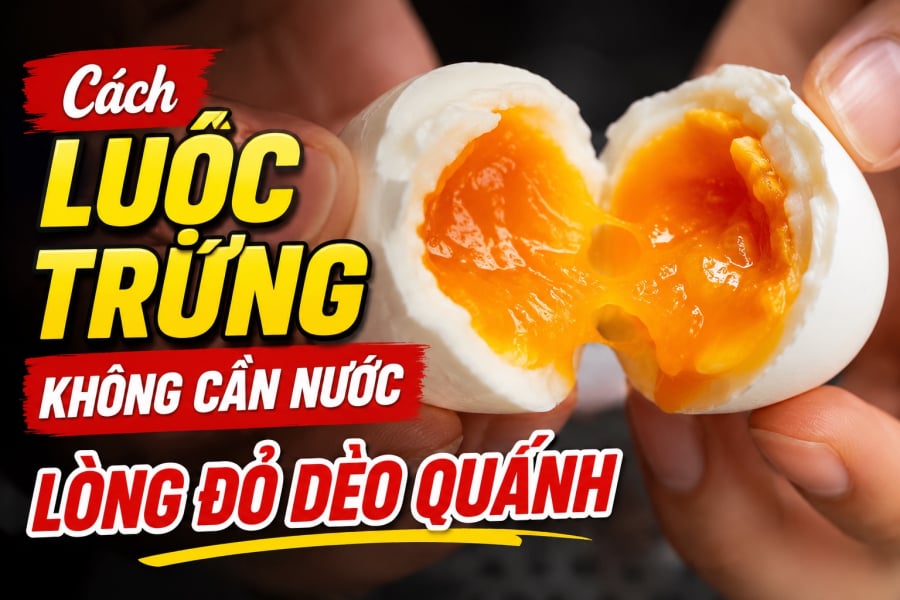 Tạo ảnh hình chữ nhật, cận cảnh khi tách đôi quả trứng, nổi bật text: Cách luộc trứng không cần nước, lòng đỏ dẻo quánh