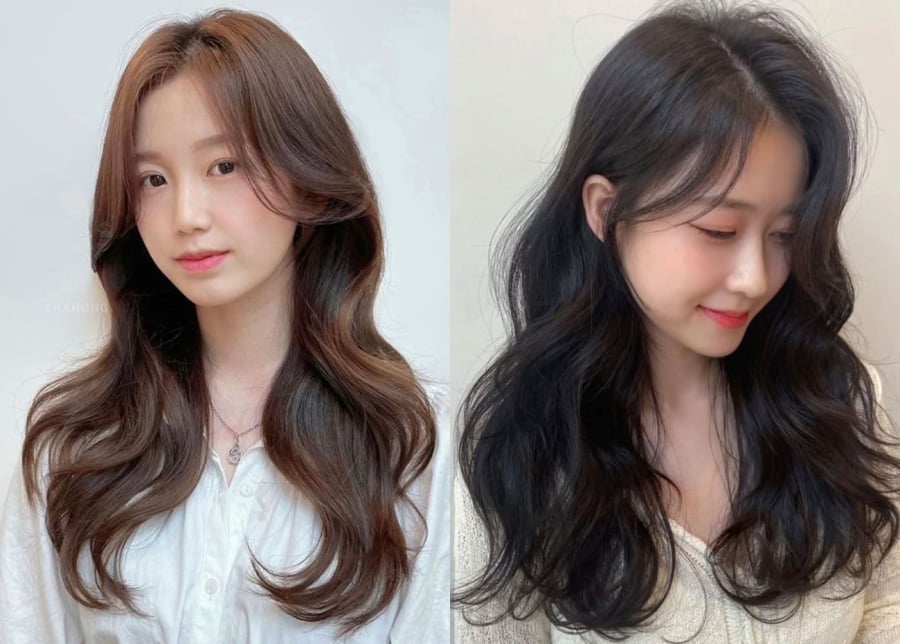 Phần tóc được uốn tự nhiên buông dọc hai bên má tạo hiệu ứng che bớt góc cạnh và giúp gương mặt trông thanh thoát hơn.