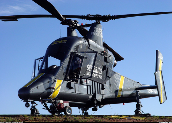 Khởi nguồn là chiếc trực thăng có người lái nhưng K-max sau đó đã được điều chỉnh tùy biến để trở thành một chiếc trực thăng có hệ thống điều khiển tự động. Điều này giúp tiết kiệm rất nhiều so với việc thiết kế một phương tiện không người lái hoàn toàn mới tự hành không có cabin...