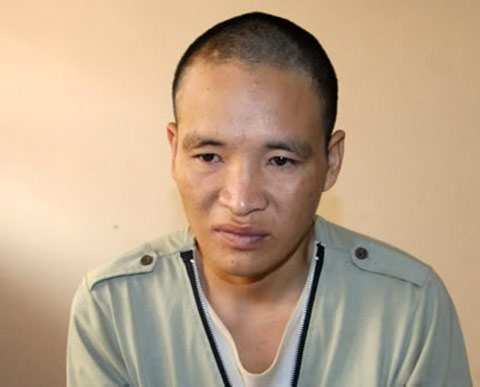 Hung thủ Huỳnh Văn Hạnh tại cơ quan điều tra