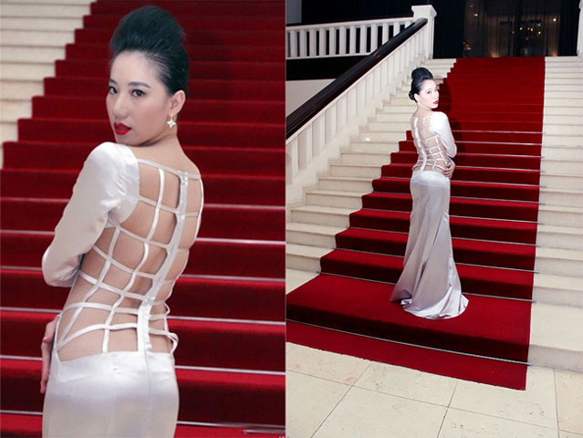  Hay bộ đầm hở lưng không những không làm nổi lên vẻ quyến rũ của Chung Thục Quyên mà làm cho phần lưng của nữ người mẫu trở nên kỳ quặc.