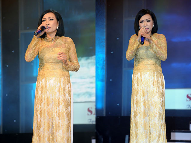    Phương Thanh mặc áo dài đằm thắm, nức nở thể hiện những bản tình ca buồn trong đêm nhạc tại TP HCM.