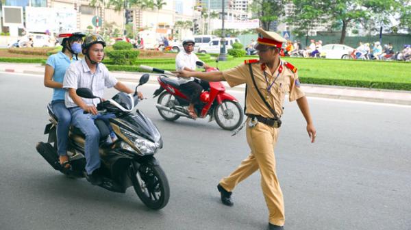 Cảnh sát giao thông sẽ phạt xe không chính chủ trong một số trường hợp từ 15/4. Ảnh TTO