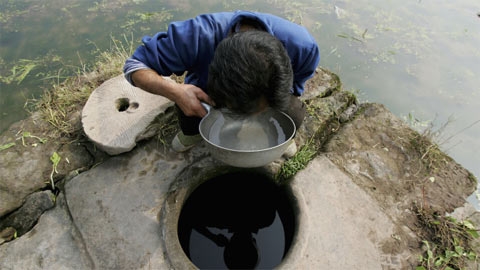 Nước ở ngôi làng gần Trùng Khánh này có thể đã khiến hàng chục người chết vì bệnh ung thư chỉ trong 3 năm. (Ảnh: Getty)