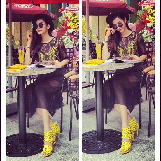 Hoàng Thùy lại khoe phong cách thời trang cực chất với phụ kiện giày và túi màu vàng chanh, màu hot của mùa hè năm 2014.