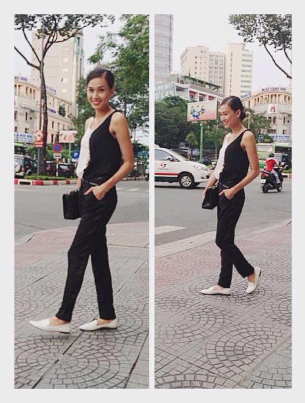 Người đẹp Dương Thùy Linh khá gầy và già hơn với bộ trang phục đen trắng khi bước ra phố.
