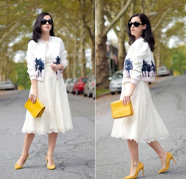 Nàng fashionista Veronica Popoiacu lãng mạn khi diện váy midi uyển chuyển, nhấn nhá các phụ kiện gam vàng cho set đồ trắng nhẹ nhàng.