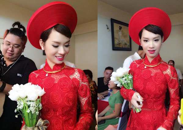 Trà My Idol diện áo dài màu đỏ kết hợp mũ mấn đỏ trong lễ rước dâu.