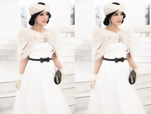 Lý Nhã Kỳ rạng ngời và cuốn hút trên đất Pháp với bộ váy theo phong cách công nương màu trắng.