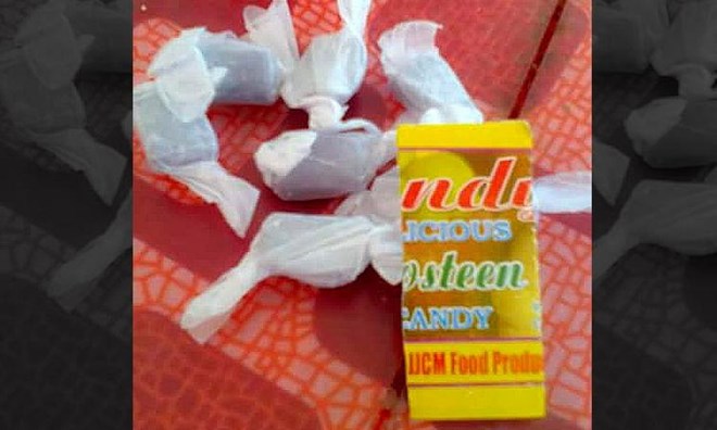 Ăn kẹo sầu riêng nhiễm độc, 1.300 học sinh nhập viện