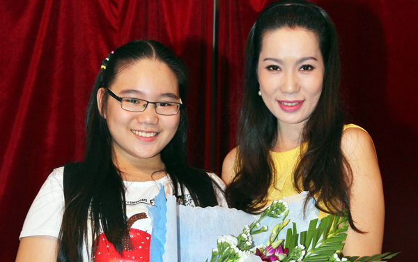 Khánh Ngân - con gái lớn của Á hậu Việt Nam 1994 năm nay 13 tuổi nhưng đã lớn phổng phao.