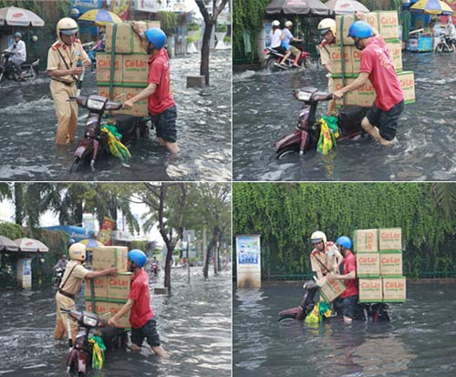 Trung sĩ Nguyễn Xuân Minh (21 tuổi) nhiệt tình giúp đỡ người dân chở nhiều thùng hàng khi xe bị chết giữa biển nước tại đường Hòa Bình (phường 5, quận 11, TP. HCM) từng gây 'sốt' cộng đồng mạng vào giữa tháng 5/2013.