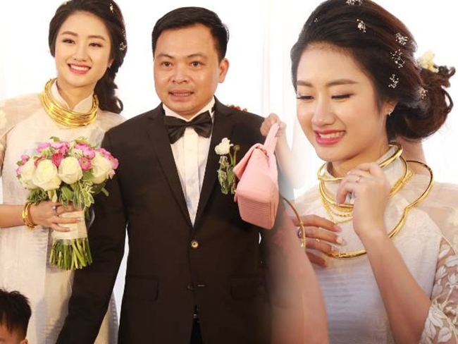 Trong buổi lễ thành hôn tại nhà trai, Hoa hậu Thu Ngân diện áo dài trắng tinh tế nhẹ nhàng. Cô được người thân trao cho nhiều của hồi môn quý giá mà bất kỳ cô dâu nào cũng ao ước.