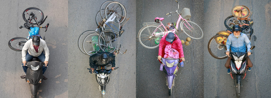Xe máy chở xe đạp kiểu Hà Nội.(Ảnh Phạm Thành Long)