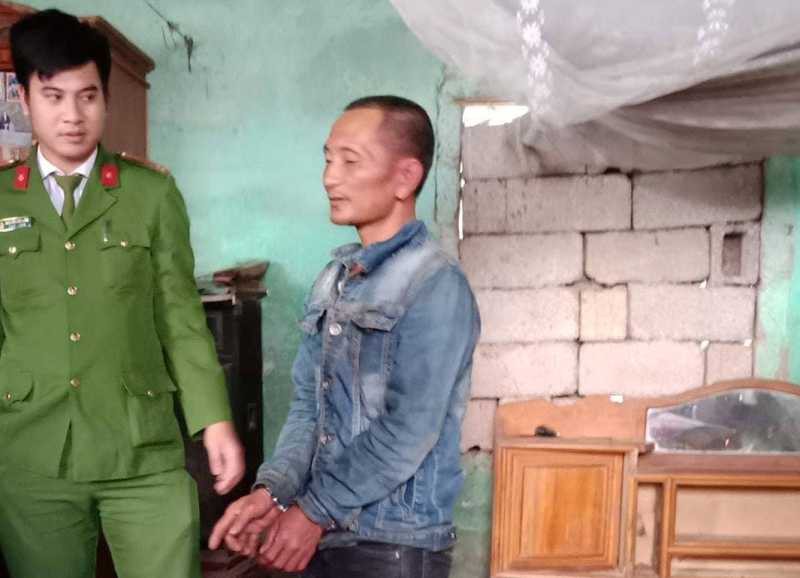 Lê Văn Sơn bị công an bắt giữ.
