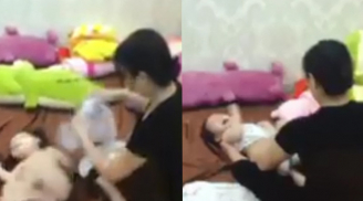 Mẹ chết lặng xem lại camera phát hiện người giúp việc bạo hành dã man con gái hơn 1 tuổi