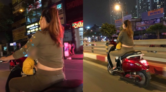 Mẹ vừa lái xe vừa thản nhiên cho con bú khiến người đi đường hốt hoảng