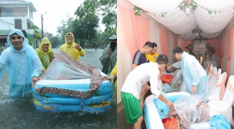 Đúng ngày đại hỉ thì mưa ngập như sông, chú rể đành mang phao bơi để 'dẫn lễ' sang nhà gái