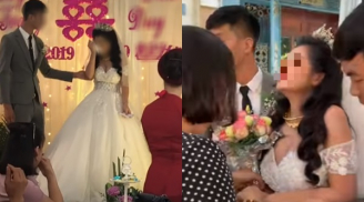 Đang đứng làm lễ cưới trước mặt quan khách nhưng cô dâu lại có biểu cảm 'lạ'